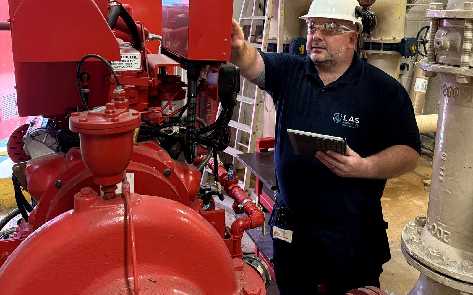 LAS carrying out an inspection of a commercial sprinkler system