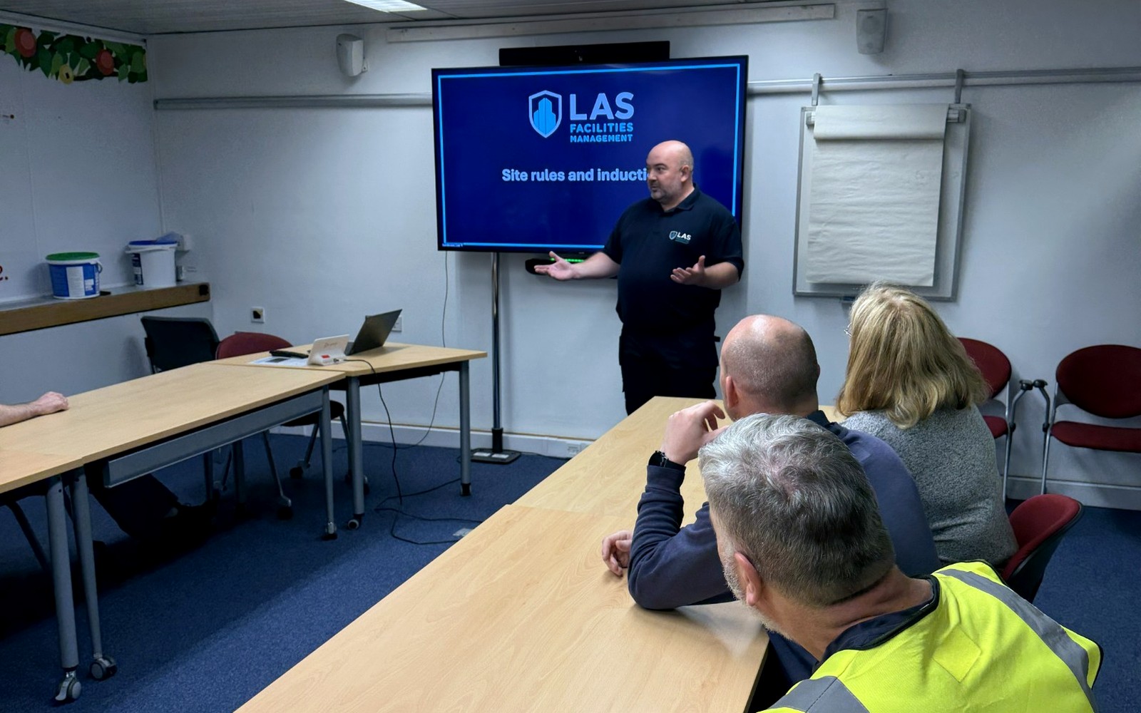 Employees and contractors attending an LAS site induction briefing